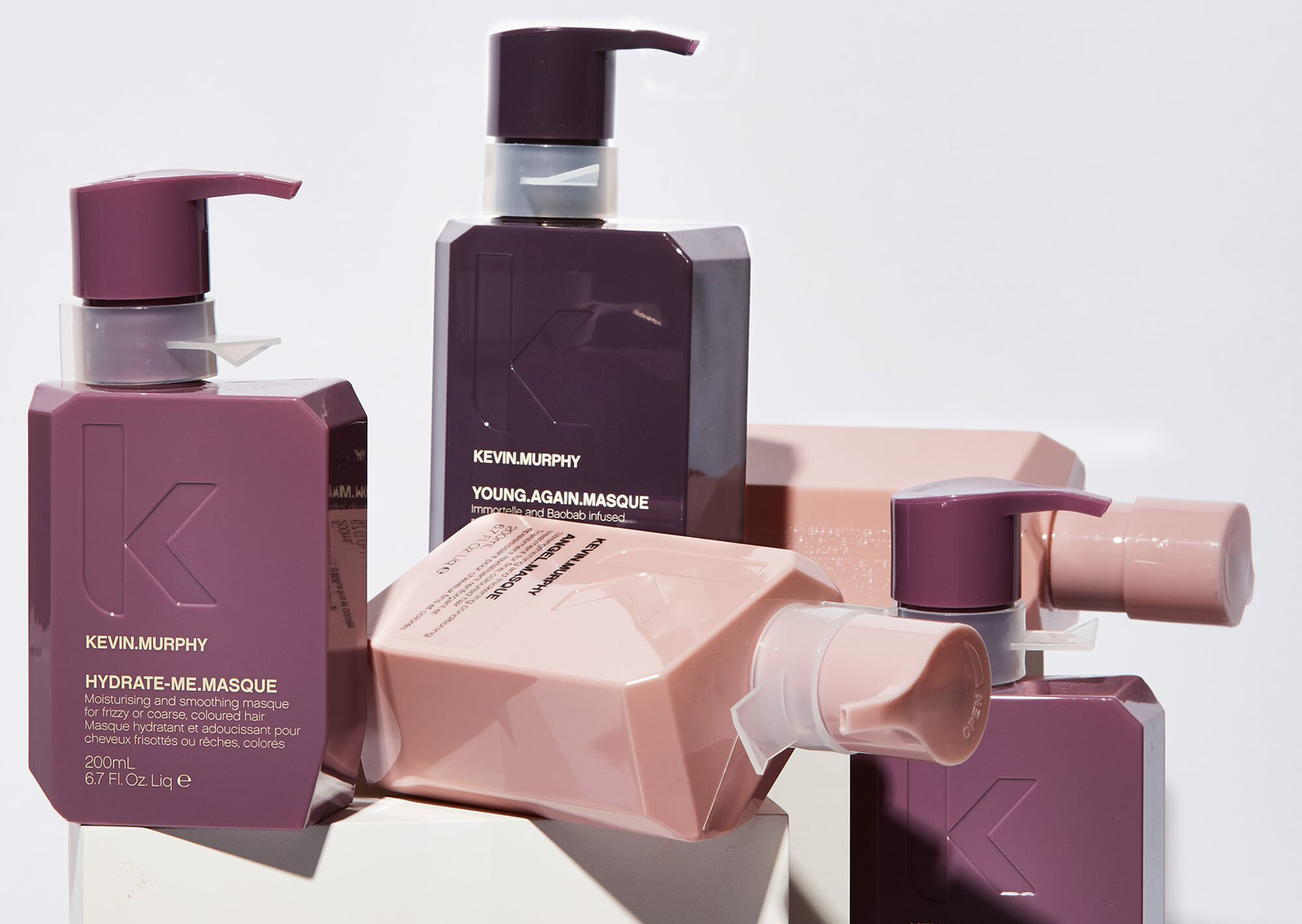 An array of professional hair care products from Kevin Murphy, set against a clean white backdrop.